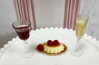 This is a miniature 1:6 scale raspberry vanilla caramel flan, with a choice of deep red wine or champagne. 